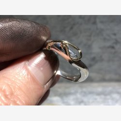 Slvring med 14 krt. guld bnd